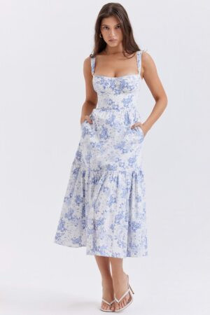 vestido-midi-evase-floral-azul-claro-babado-barra